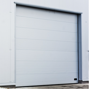 Porte Sectionnelle Industrielle L 3.5 m x H 4.5 m en panneaux sandwich 40 mm isolé Acier de Type Micro-Vague Lisse.
