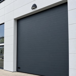 Porte Sectionnelle Industrielle L 4.0 m x H 3.0 m en panneaux sandwich 40 mm isolé Acier de Type S Stucco.