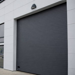 Porte Sectionnelle Industrielle L 3.5 m x H 6.5 m en panneaux sandwich 40 mm isolé Acier de Type S Stucco.
